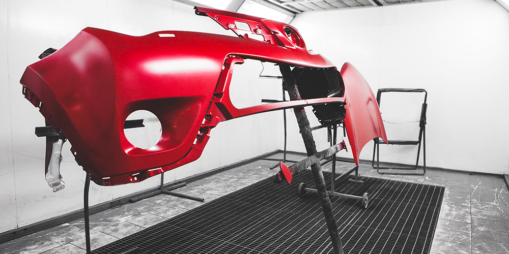 Image Of Newly Painted Car Bumper In Red